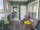 Charming screened patio with cozy seating, perfect for enjoying outdoor relaxation at 4802 51St W St # 1724, Bradenton, FL 34210
