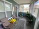 Relaxing screened patio furnished with comfortable seating and green plants at 4802 51St W St # 1724, Bradenton, FL 34210