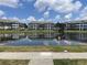 Scenic view of the condo buildings reflected in the serene pond at 4802 51St W St # 1724, Bradenton, FL 34210