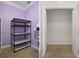 Double image view of a walk-in closet featuring functional metal shelving for efficient organization at 4951 Brightstone Pl, Spring Hill, FL 34609