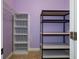 Walk-in closet features sturdy metal and patterned shelves providing ample storage space at 4951 Brightstone Pl, Spring Hill, FL 34609