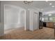 Open-concept design showcasing an eat-in kitchen with seamless flow into the dining and living areas at 4951 Brightstone Pl, Spring Hill, FL 34609