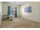 Room with carpeting, paint, and furniture near a bright window at 4951 Brightstone Pl, Spring Hill, FL 34609