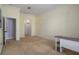 Open room design with neutral walls, carpet flooring, and ample space at 4951 Brightstone Pl, Spring Hill, FL 34609