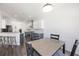 Bright dining area with modern lighting and ample natural light at 5020 Torrey Pines Run, Bradenton, FL 34211