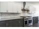 Modern kitchen boasts stainless appliances, granite countertops, and marble backsplash at 5020 Torrey Pines Run, Bradenton, FL 34211