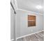 Empty bedroom features laminate flooring and a window at 513 25Th W Ave, Bradenton, FL 34205
