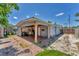 Back of house with patio, brick pavers, and additional storage shed at 513 25Th W Ave, Bradenton, FL 34205