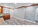 Bright kitchen features granite countertops, wood cabinets, and laminate wood flooring at 513 25Th W Ave, Bradenton, FL 34205