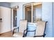Relaxing balcony with comfortable seating, perfect for enjoying ocean breezes and views at 5300 Gulf Dr # 501, Holmes Beach, FL 34217