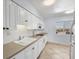 A cozy kitchen provides function, with an adjacent window providing abundant natural light at 5300 Gulf Dr # 501, Holmes Beach, FL 34217
