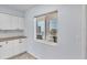 A window overlooks a balcony at 5300 Gulf Dr # 501, Holmes Beach, FL 34217