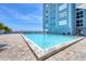 Outdoor swimming pool with sundeck and a beautiful beach view at 5300 Gulf Dr # 501, Holmes Beach, FL 34217