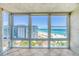 Bright sunroom with panoramic ocean views, perfect for relaxation and enjoying the scenery at 5300 Gulf Dr # 501, Holmes Beach, FL 34217
