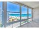 Beautiful sunroom with floor-to-ceiling windows offering expansive views of the beach and ocean at 5300 Gulf Dr # 501, Holmes Beach, FL 34217