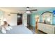 Spacious bedroom with lots of room and a peek into the bathroom and closet areas at 5603 1St Avenue Dr Nw, Bradenton, FL 34209
