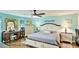 Well-lit bedroom features a ceiling fan and ample space for a bedroom set at 5603 1St Avenue Dr Nw, Bradenton, FL 34209