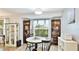 Charming breakfast nook area has lots of light and display cabinets at 5603 1St Avenue Dr Nw, Bradenton, FL 34209