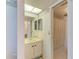 Bathroom featuring tiled shower and vanity with plenty of storage at 6030 7Th W Ave # 6030, Bradenton, FL 34209