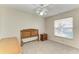 Bedroom with closet and window; natural light filters through the window creating a welcoming space at 6030 7Th W Ave # 6030, Bradenton, FL 34209