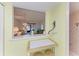 Bright breakfast nook with seating and view into the living room, offering an open and airy feel at 6030 7Th W Ave # 6030, Bradenton, FL 34209