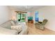 Living area featuring a sliding glass door to the outside and comfortable seating at 6030 7Th W Ave # 6030, Bradenton, FL 34209