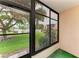 Cozy patio area overlooks a beautiful lawn, offering a tranquil outdoor space for relaxation and enjoyment at 6030 7Th W Ave # 6030, Bradenton, FL 34209