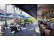 Inviting outdoor restaurant seating with tables and chairs, offering a relaxed dining experience at 6110 Country Club Way # 102, Sarasota, FL 34243