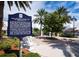 Historical marker surrounded by palm trees and landscaping, highlighting John Ringling's vision for St. Armands Key at 6110 Country Club Way # 102, Sarasota, FL 34243