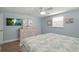 Main bedroom features ample natural light and a large dresser at 6150 Midnight Pass Rd # V4, Sarasota, FL 34242