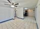 The Living Room, featuring tile flooring and neutral walls, offering a clean and versatile space at 616 63Rd W Ave, Bradenton, FL 34207