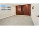 Spacious bedroom with built-in storage, including drawers, shelves, and cabinets at 6300 Midnight Pass Rd # 5, Sarasota, FL 34242