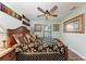 Comfortable bedroom featuring a ceiling fan and a cozy atmosphere at 6332 7Th E Ct, Bradenton, FL 34203