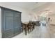 The dining area is part of an open-concept plan with access to the living room at 6332 7Th E Ct, Bradenton, FL 34203