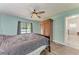 This main bedroom provides lots of natural light and features a large wardrobe for storage at 6332 7Th E Ct, Bradenton, FL 34203