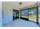 Enclosed patio with screened windows, offering an indoor-outdoor living space at 6332 7Th E Ct, Bradenton, FL 34203