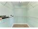 A walk-in closet with shelving for organization and storage at 6332 7Th E Ct, Bradenton, FL 34203