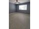 A bright bedroom with a ceiling fan and a light paint tone at 6360 Jordan St, North Port, FL 34287