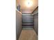 Organized closet with multiple shelves for efficient storage, maximizing space at 6360 Jordan St, North Port, FL 34287
