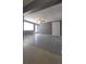 Inviting living room with a ceiling fan, a large window and nice tile flooring and light gray walls at 6360 Jordan St, North Port, FL 34287