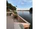 Scenic waterfront view from a private deck, offering serene water views and landscaping at 72 4Th Ave # 72, Venice, FL 34285