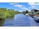 A waterfront property with access to a canal, ideal for boating and waterside living at 72 4Th Ave # 72, Venice, FL 34285