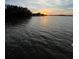 Serene waterfront view during sunset, perfect for relaxing by the water's edge at 72 4Th Ave # 72, Venice, FL 34285
