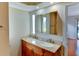 Modern bathroom vanity with double sinks and a large mirror cabinet at 8402 13Th Nw Ave, Bradenton, FL 34209