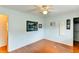 Light blue bedroom with hardwood floors, and closet access at 8402 13Th Nw Ave, Bradenton, FL 34209