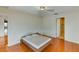 Modern bedroom with hardwood floors and an en-suite bathroom featuring a glass shower at 8402 13Th Nw Ave, Bradenton, FL 34209