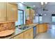 Bright and functional kitchen boasts granite countertops, stainless steel appliances, and ample cabinetry at 8402 13Th Nw Ave, Bradenton, FL 34209
