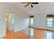 Bright and spacious living room with hardwood floors, neutral paint, and ample natural light from windows at 8402 13Th Nw Ave, Bradenton, FL 34209