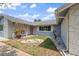 Charming home exterior featuring a well-maintained front yard with mature landscaping at 8413 Lincolnshire Dr, Hudson, FL 34667