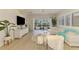 Airy living room with white furniture, light wood floors, and pool view at 8731 52Nd E Dr, Bradenton, FL 34211